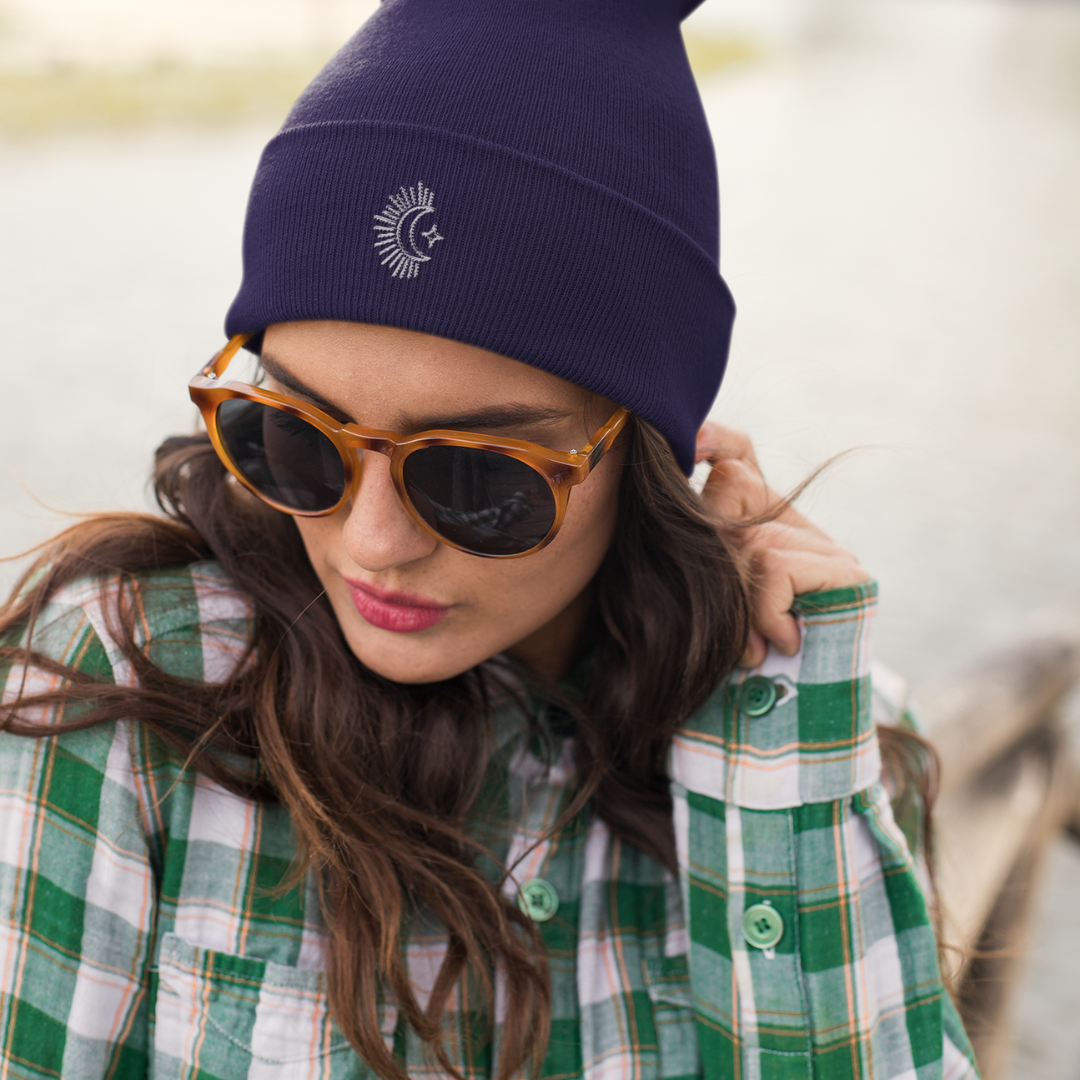 girl wearing blue moon embroidered organic cotton beanie