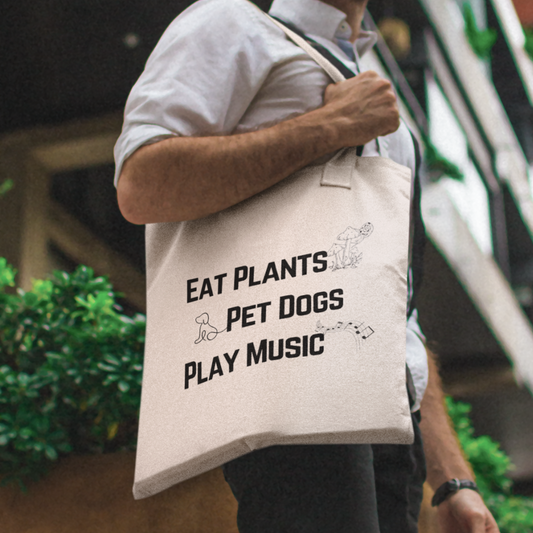 man holding plants dogs and music natural tote bag