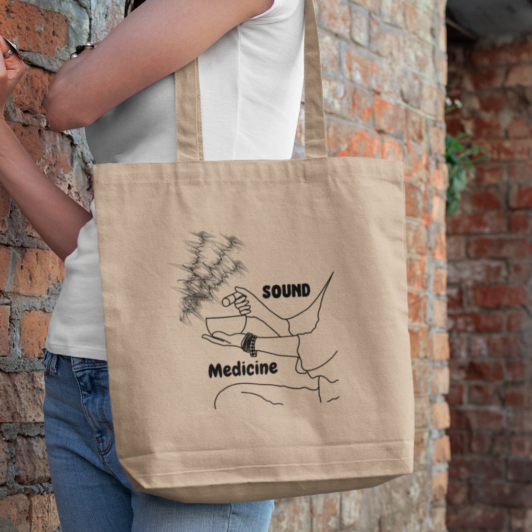 lady carrying sound healing natural organic tote bag