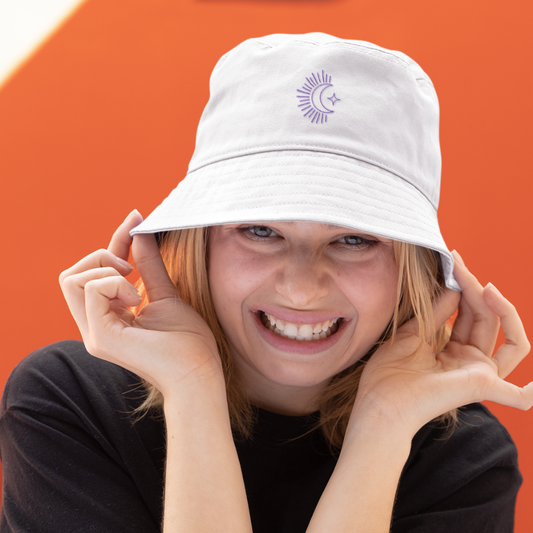 girl wearing moon embroidery organic cotton bucket hat