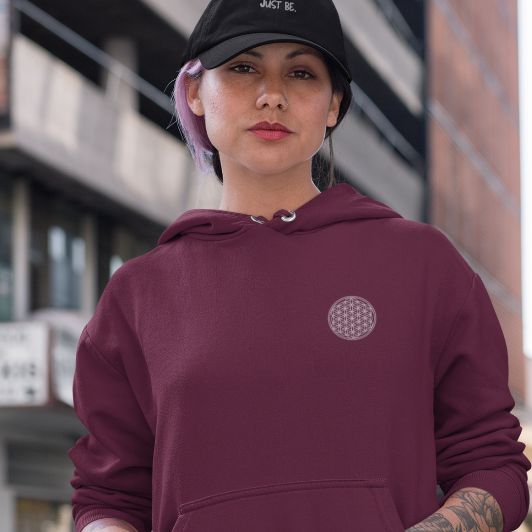 female wearing red flower of life hoodie