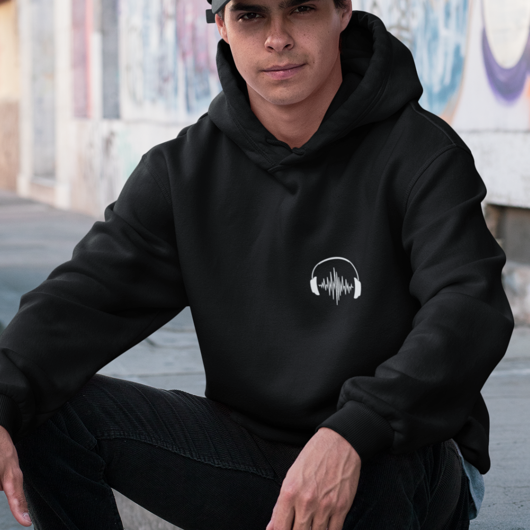 man wearing black embroidered music hoody