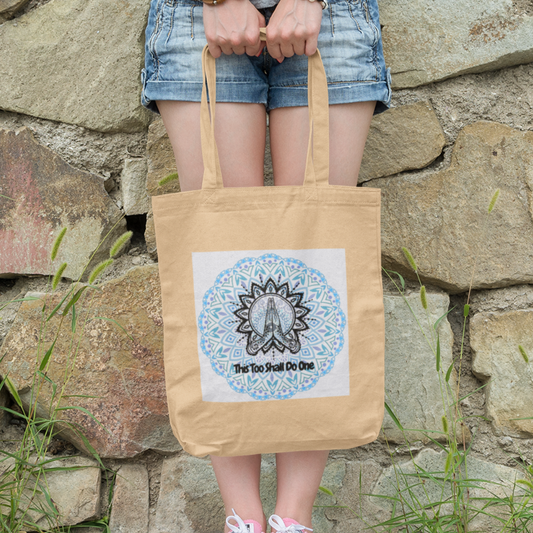 Lady carrying this too shall do one natural organic tote bag