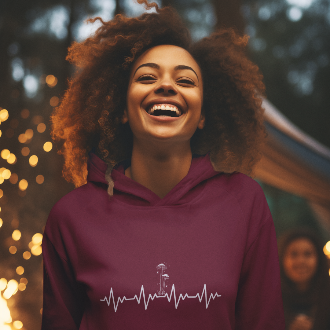 girl in Canada wearing red plant medicine mushroom hoody 