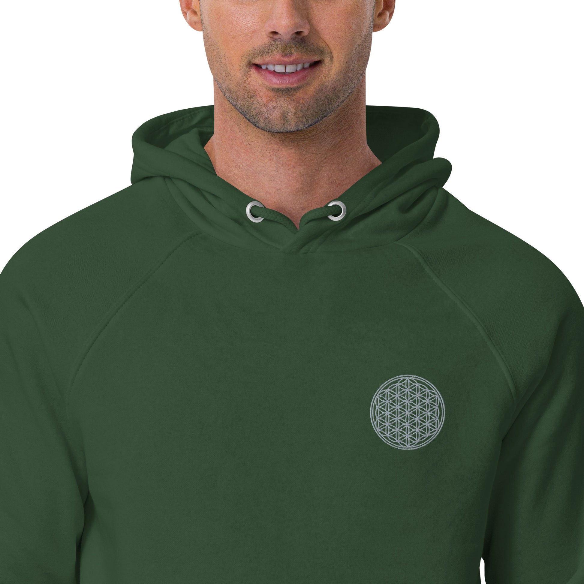 male wearing green flower of life hoodie